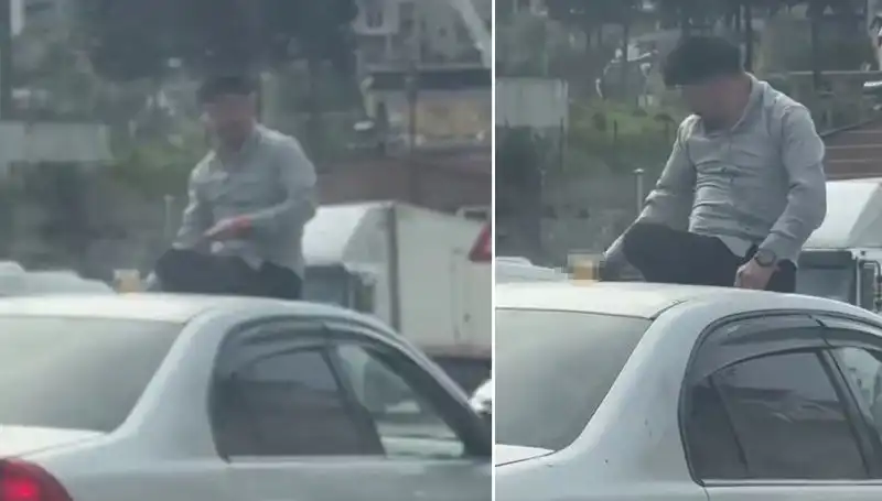 Trafikte Şaşkına Dönüştüren Olay: Otomobil Üzerinde Alem Yapanlar!